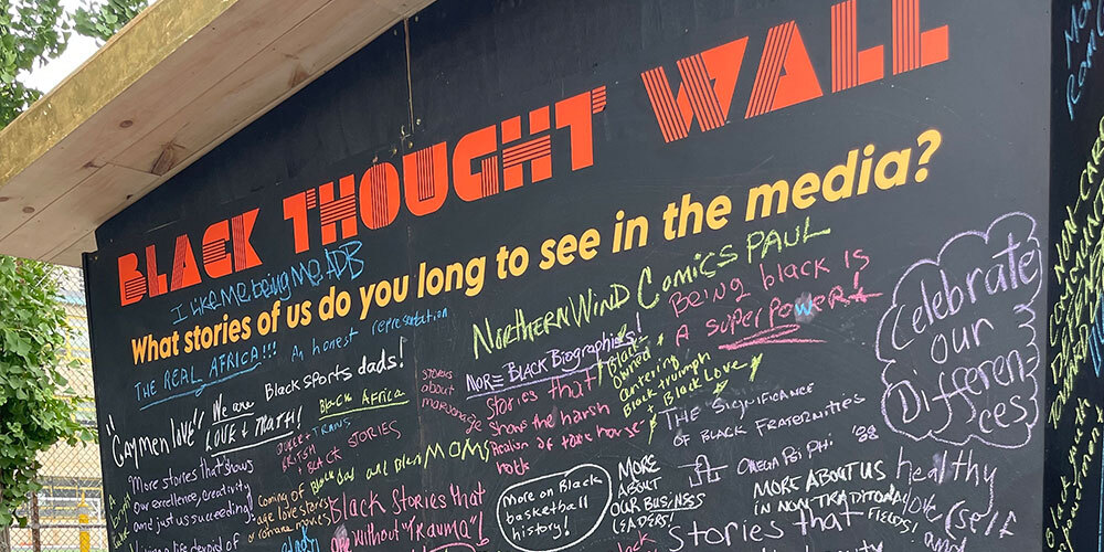 The Black Future Newsstand's Black Thought Wall features notes and reflections from visitors