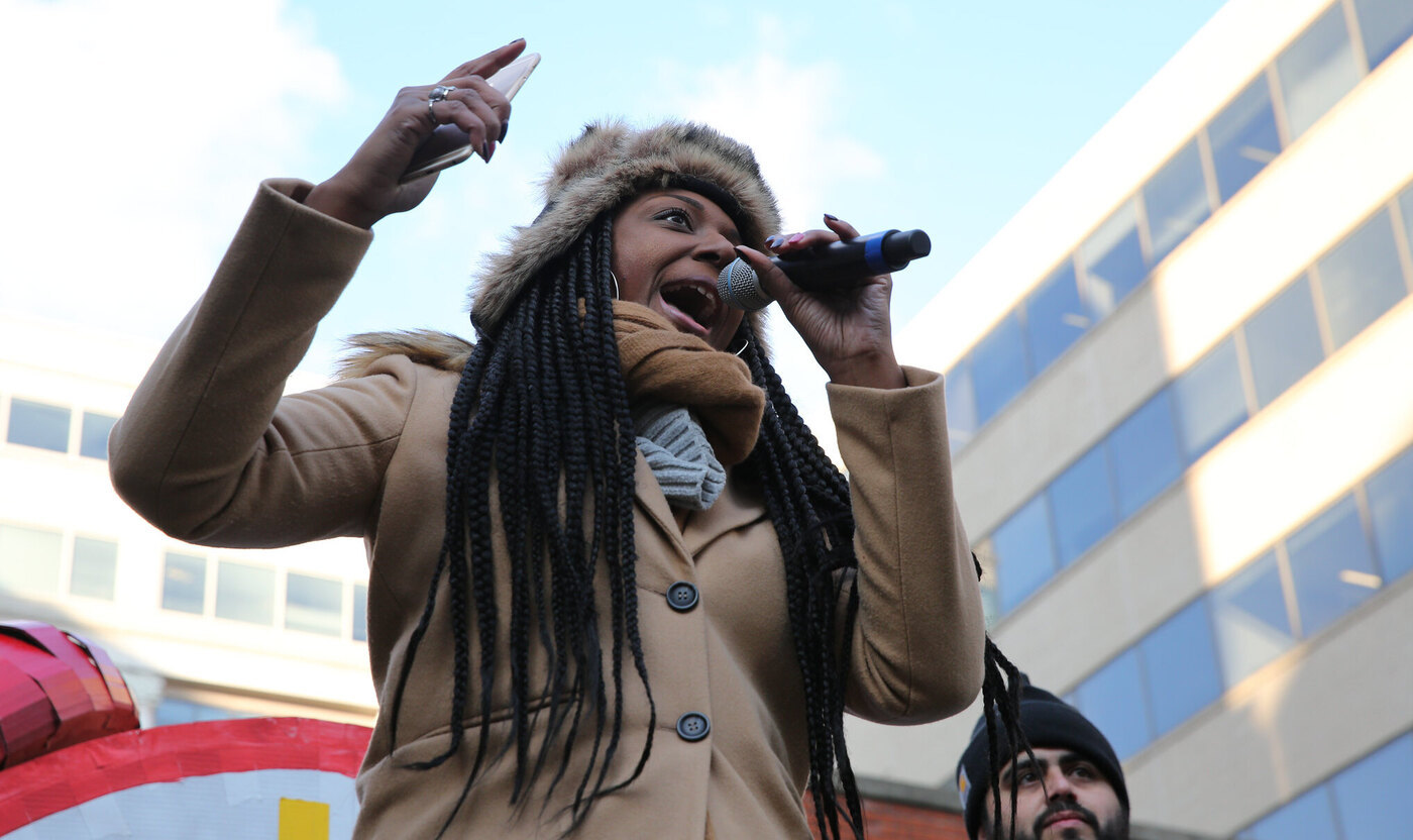 Free Press' Collette Watson singing at Net Neutrality rally
