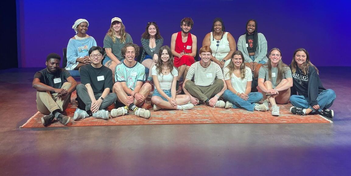 Media 2070 Campaign Manager Venneikia Williams sitting with students in her Colorado College class