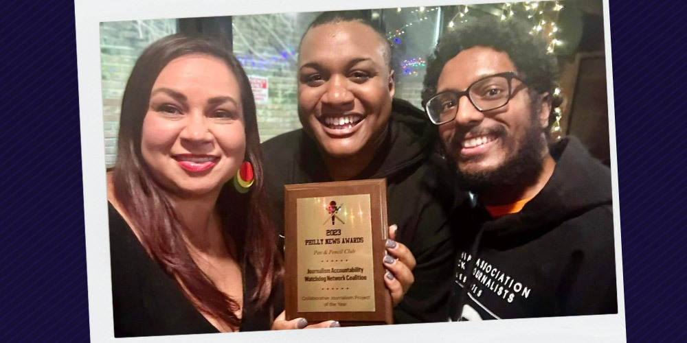 Vanessa Maria Graber, Ernest Owens and Tauhid Chappell hold the award J.A.W.N. received for Collaborative Journalism Project of the Year.
