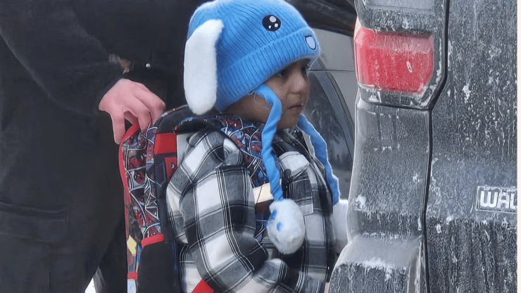 Five-year-old Liam Ramos with an ICE agent in Minneapolis