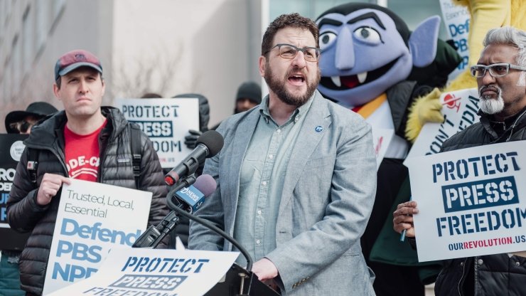 Free Press Co-CEO Craig Aaron speaking outside NPR headquarters at a "Protect Public Media" protest