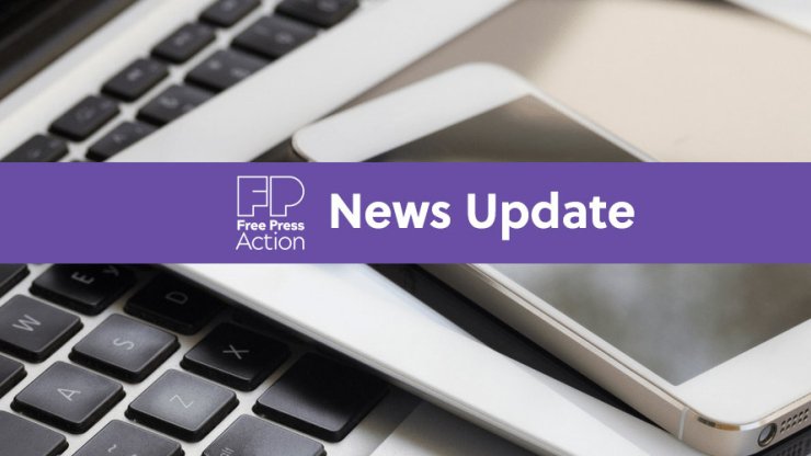 Text reading "Free Press Action News Update" against the backdrop of a keyboard and phone