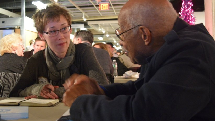 Two people sitting at a table