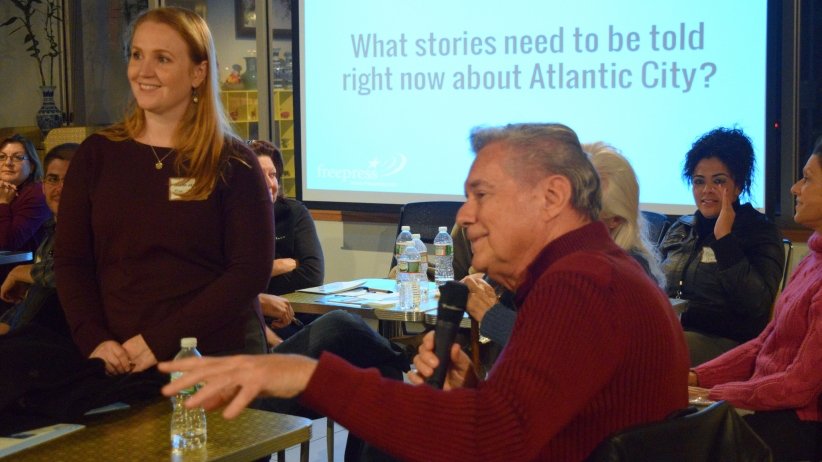 People before screen reading "Surfacing stories: What stories need to be told right now about Atlantic City?"