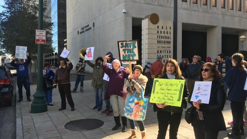 Net Neutrality activists outside building in New Orleans