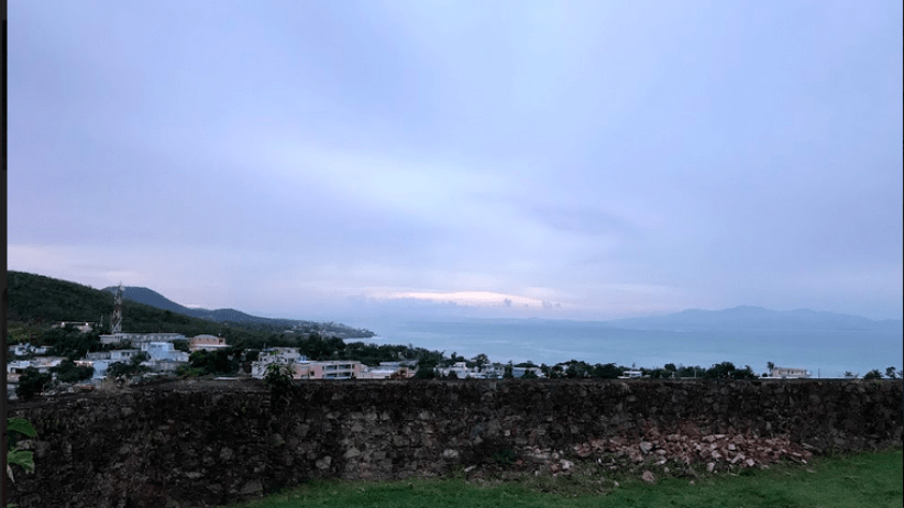 View of sky, stone wall and greenery in Puerto Rico