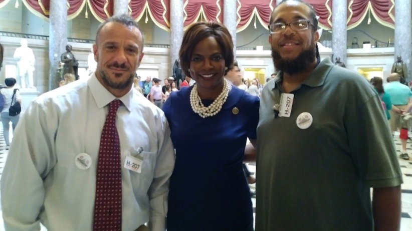 Rep. Val Demings with two constituents