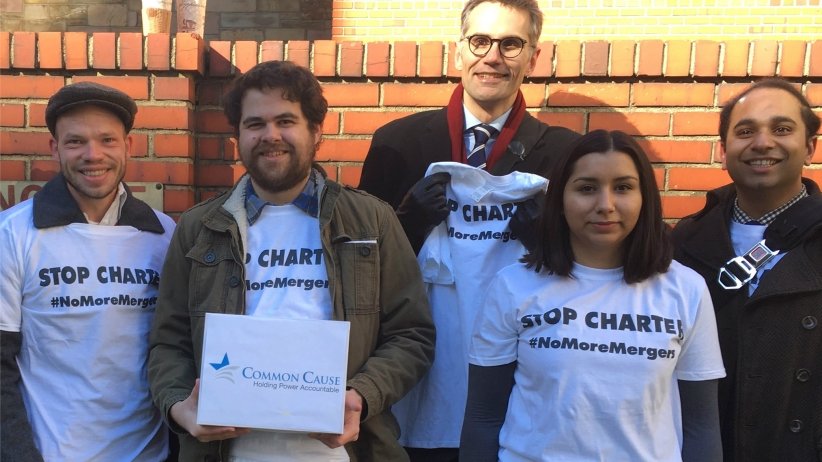 Five members of the anti-merger coalition