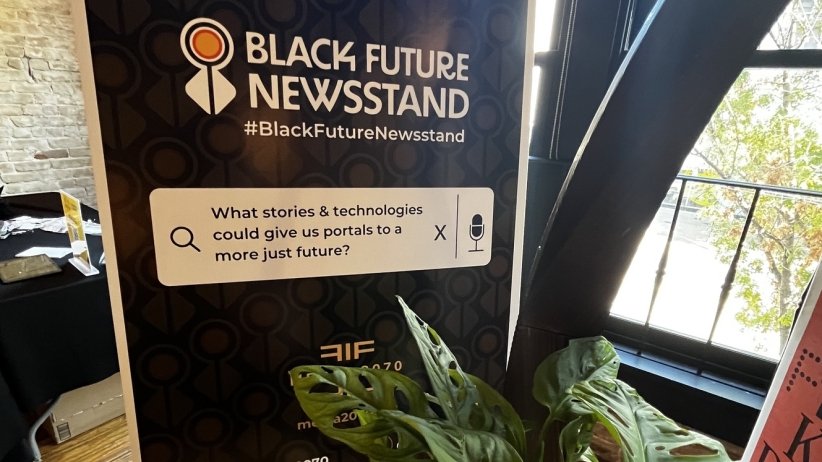 The sign for the Black Future Newsstand exhibit at AfroTech