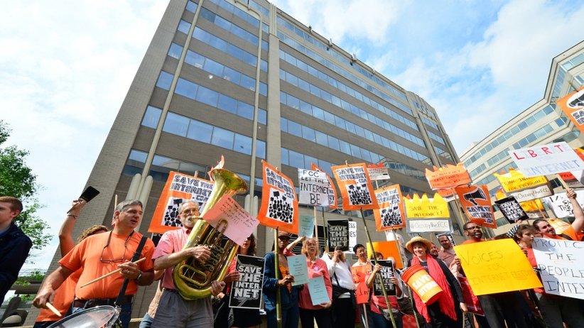 Net Neutrality activists playing instruments