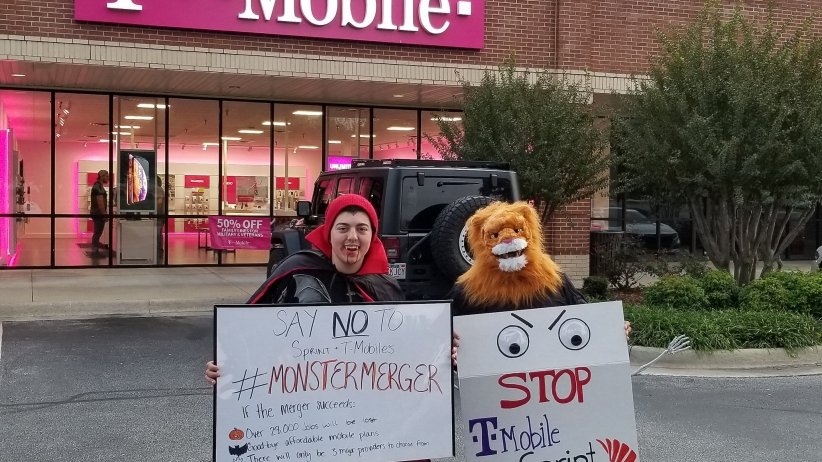 Activists dressed as a vampire and a lion