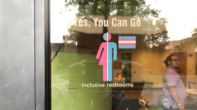 Gender-inclusive bathroom sign