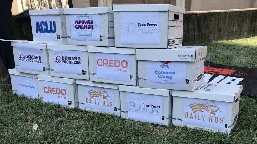 12 boxes of anti-merger petitions