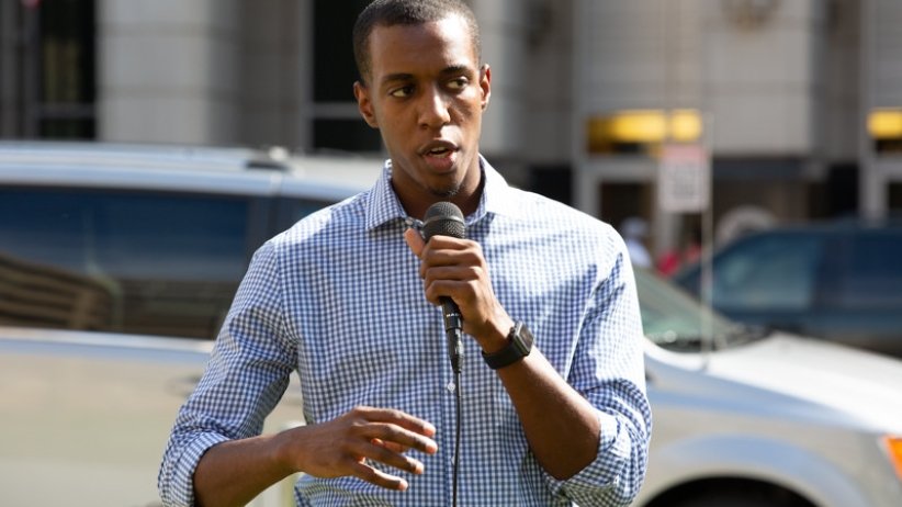 Man speaking into microphone