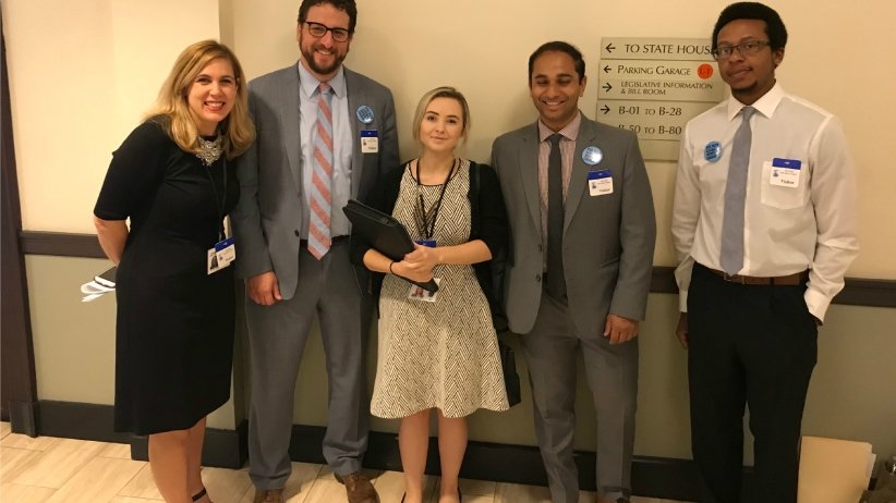 Free Press Action Fund President and CEO Craig Aaron and Free Press Action Fund Policy Counsel Gaurav Laroia with other lobby-day participants