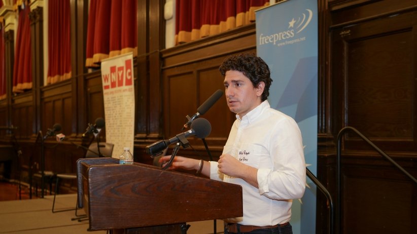 News Voices Director Mike Rispoli at the podium