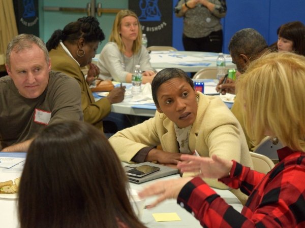 Four people talking at News Voices: New Jersey community meeting