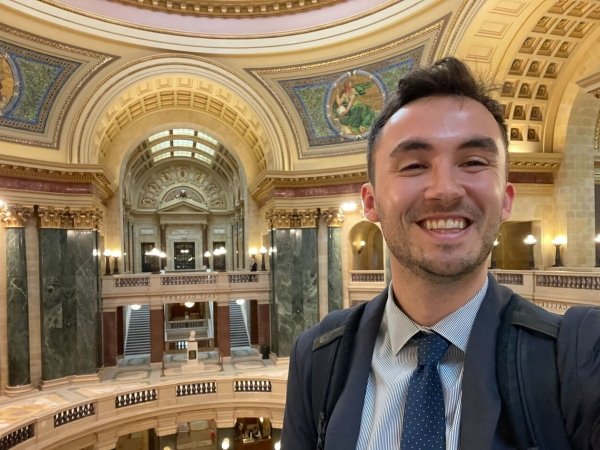 Free Press Action’s Alex Frandsen at the Wisconsin statehouse to celebrate the introduction of legislation designed to strengthen local journalism.