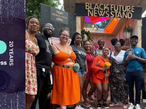 Free Press staffers and allies outside the "Black Future Newsstand" installation in Harlem