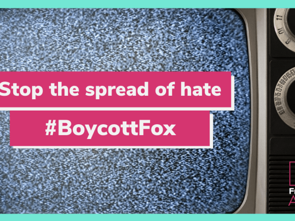 "Stop the spread of hate / #Boycott Fox" on a TV screen