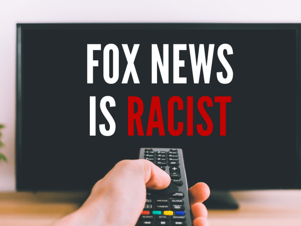 Remote control pointed at TV screen displaying the words "Fox News Is Racist"