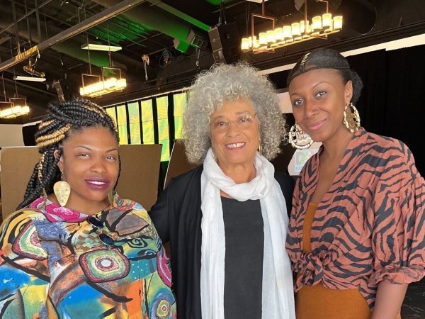 Free Press staffers Venneikia Williams and Collette Watson with Dr. Angela Davis