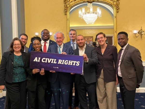 Free Press Action staff and allies with Sen. Ed Markey at introduction of AI Civil Rights Act bill