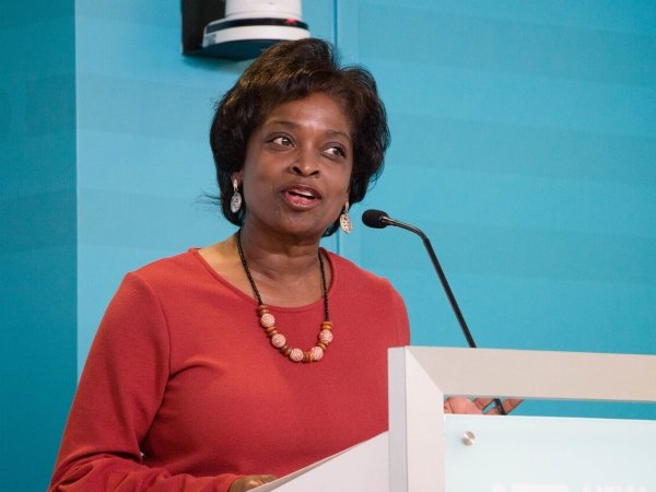 Former FCC Commissioner Mignon Clyburn speaking at a podium