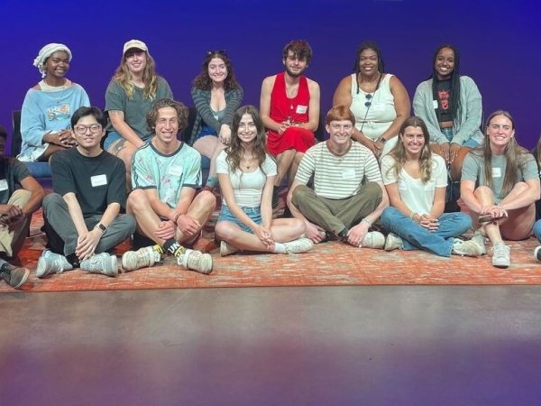 Media 2070 Campaign Manager Venneikia Williams sitting with students in her Colorado College class