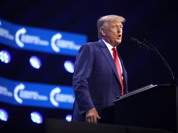 Trump giving a speech at the 2023 Turning Point Action Conference