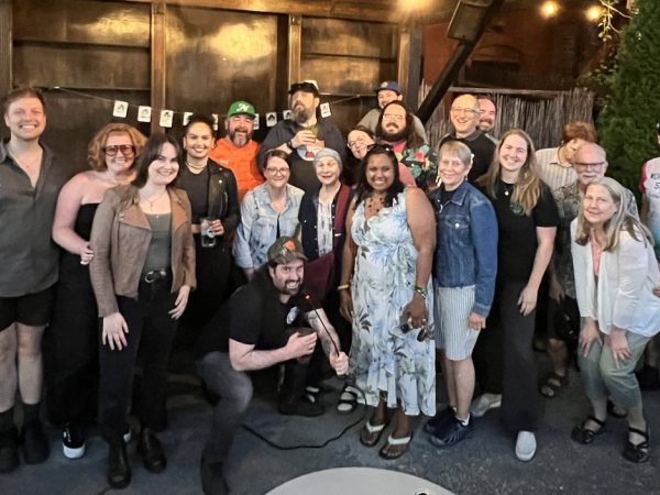 People celebrating the anniversary of the newsletter "Worcester Sucks and I Love It"