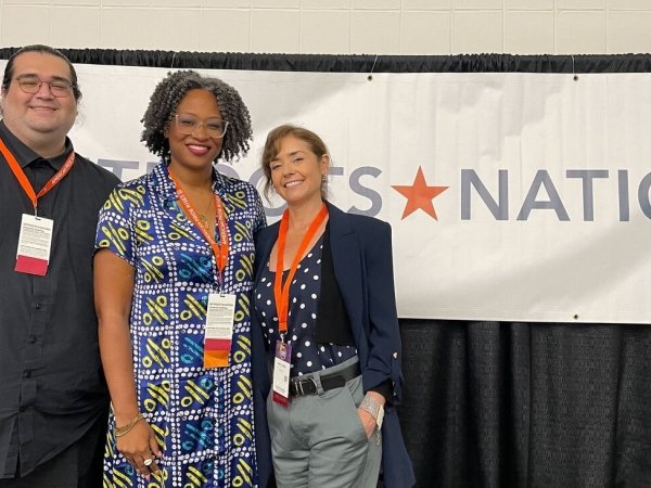 Free Press' Ruth L. Nuñez (right) standing with two people at Netroots
