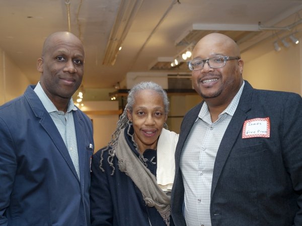 Free Press Organizer James L. Thompson (right) with two Newark residents
