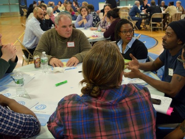 People talking around a table