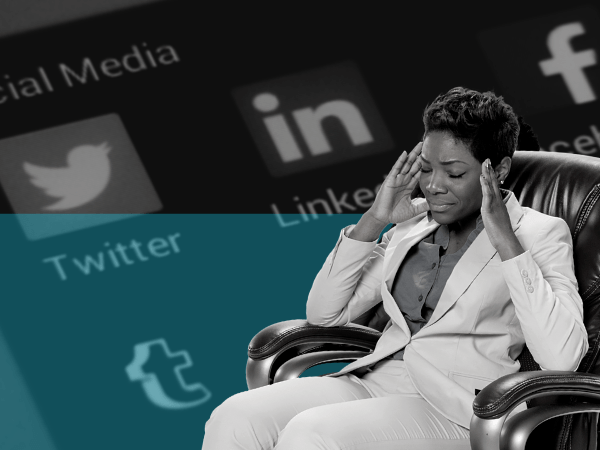 Woman rubbing temples while juxtaposed against background of social-media logos