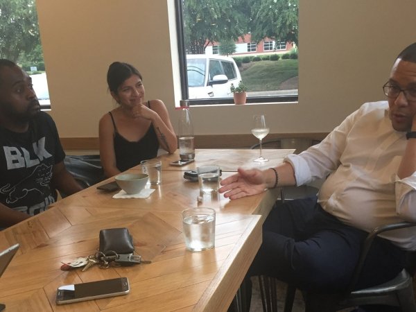 A Charlotte Observer journalist talks to community residents
