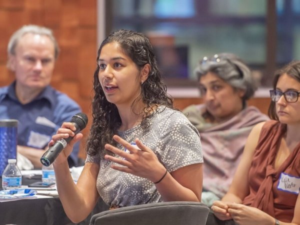 Attendee speaking at an Organizing for Neighborhood News event held earlier this year.