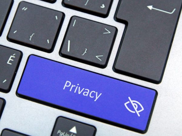 Computer keyboard with one key reading "privacy"