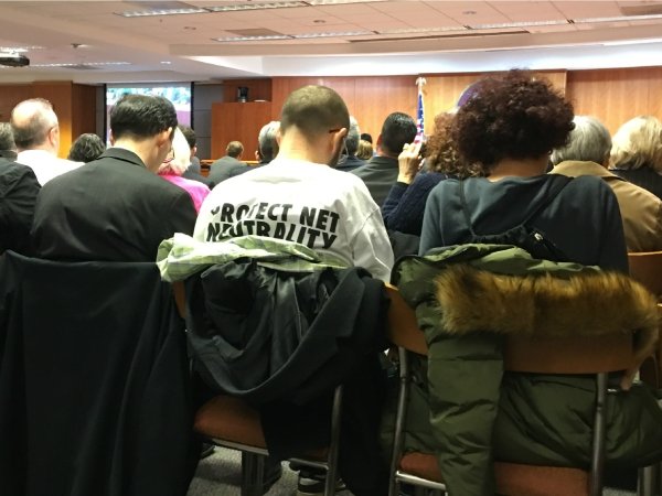 Activist wearing protect Net Neutrality T-shirt