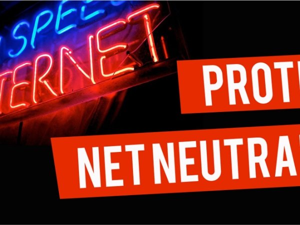 Neon sign reading "Protect Net Neutrality"