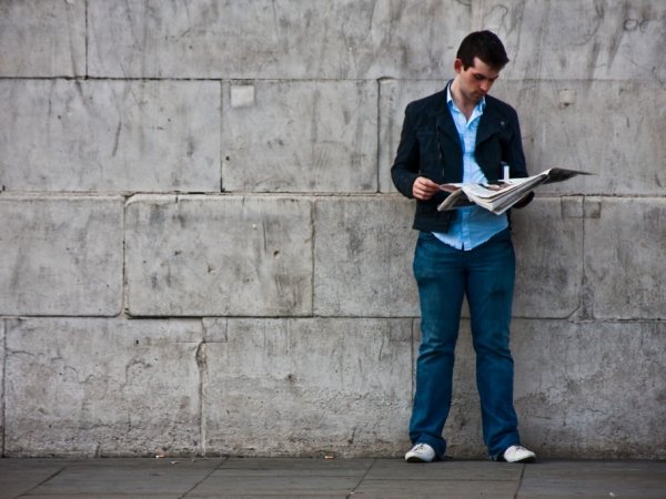 Man reading newspaper