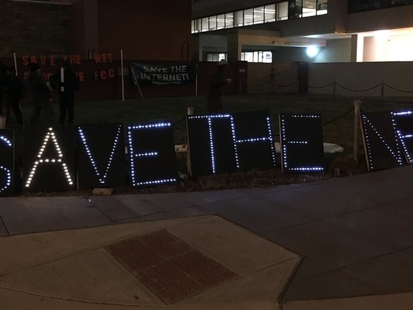 Lights spelling out "Save the Net" outside the FCC