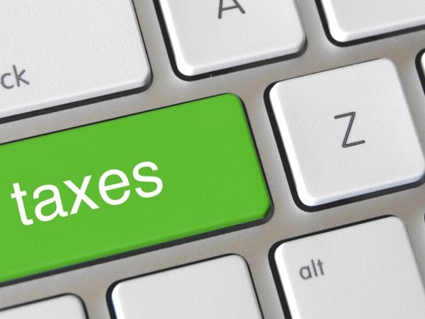 Keyboard with a key marked "Taxes"