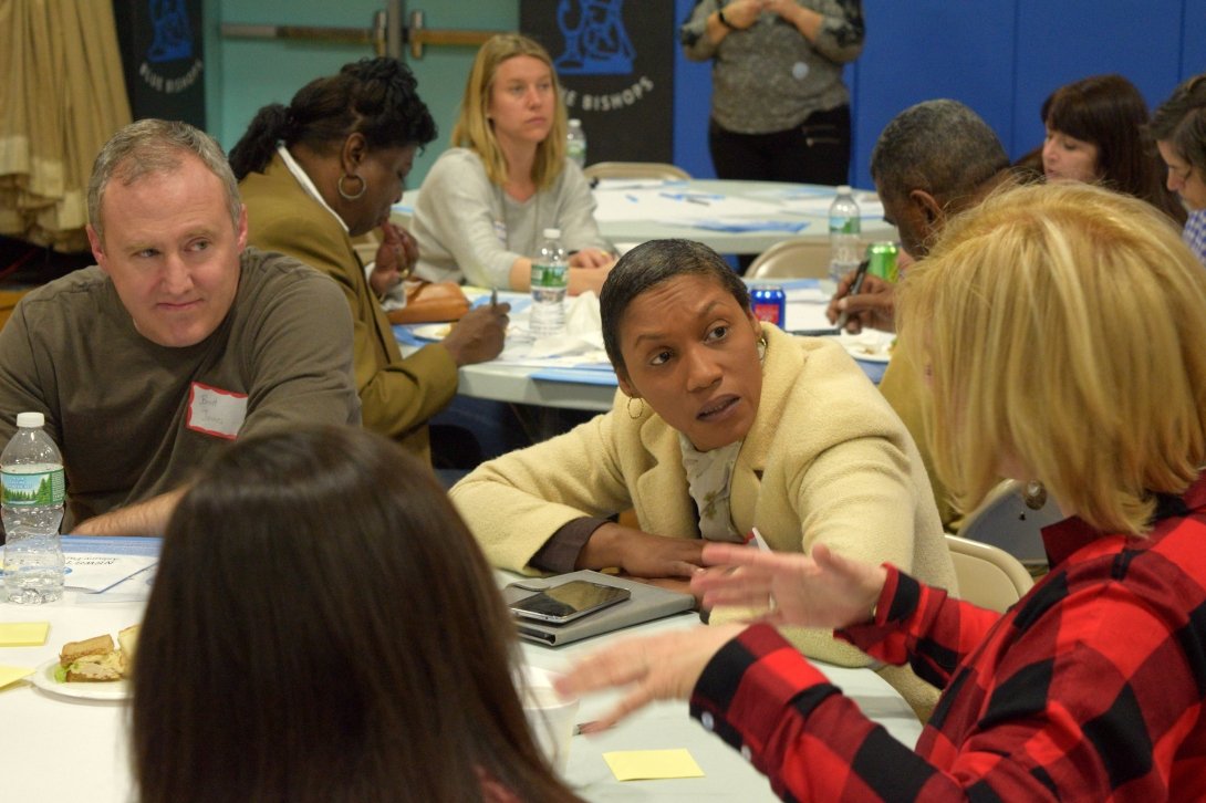 Four people talking at News Voices: New Jersey community meeting