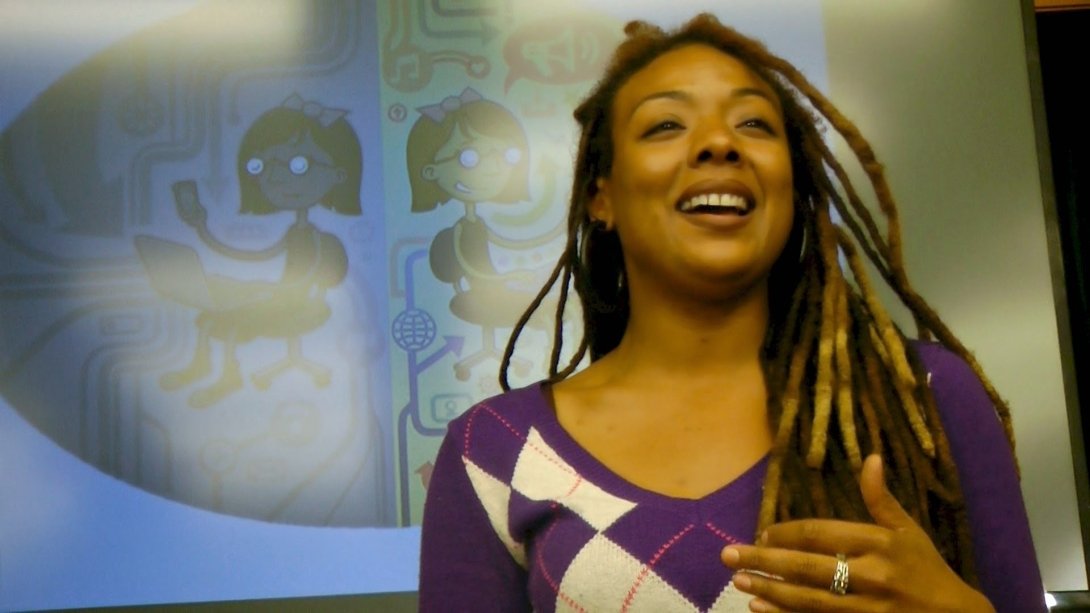 Woman in purple shirt smiling