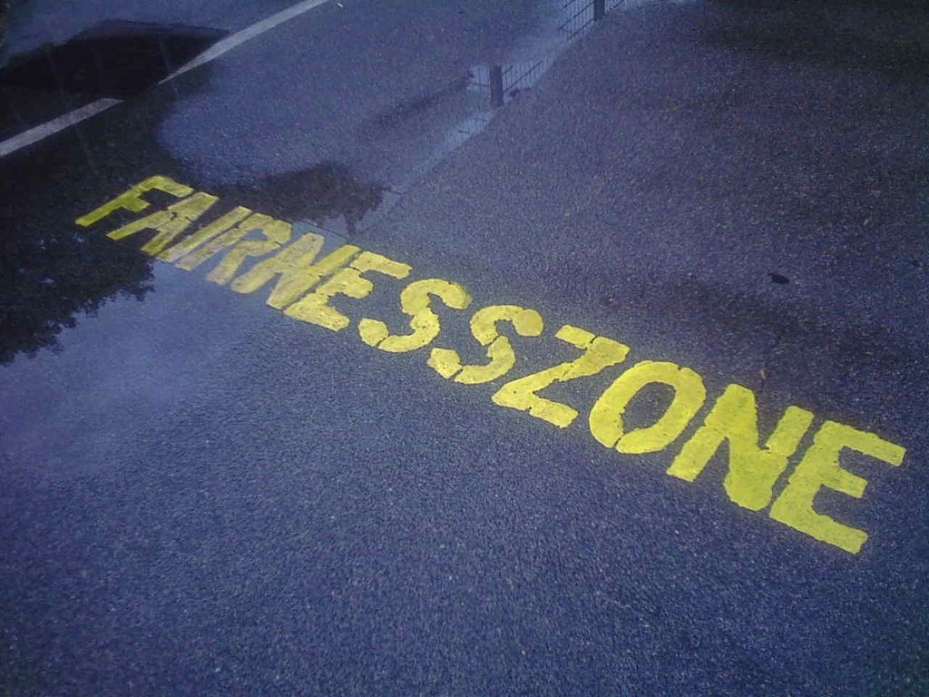 Street reading "Fairness Zone"