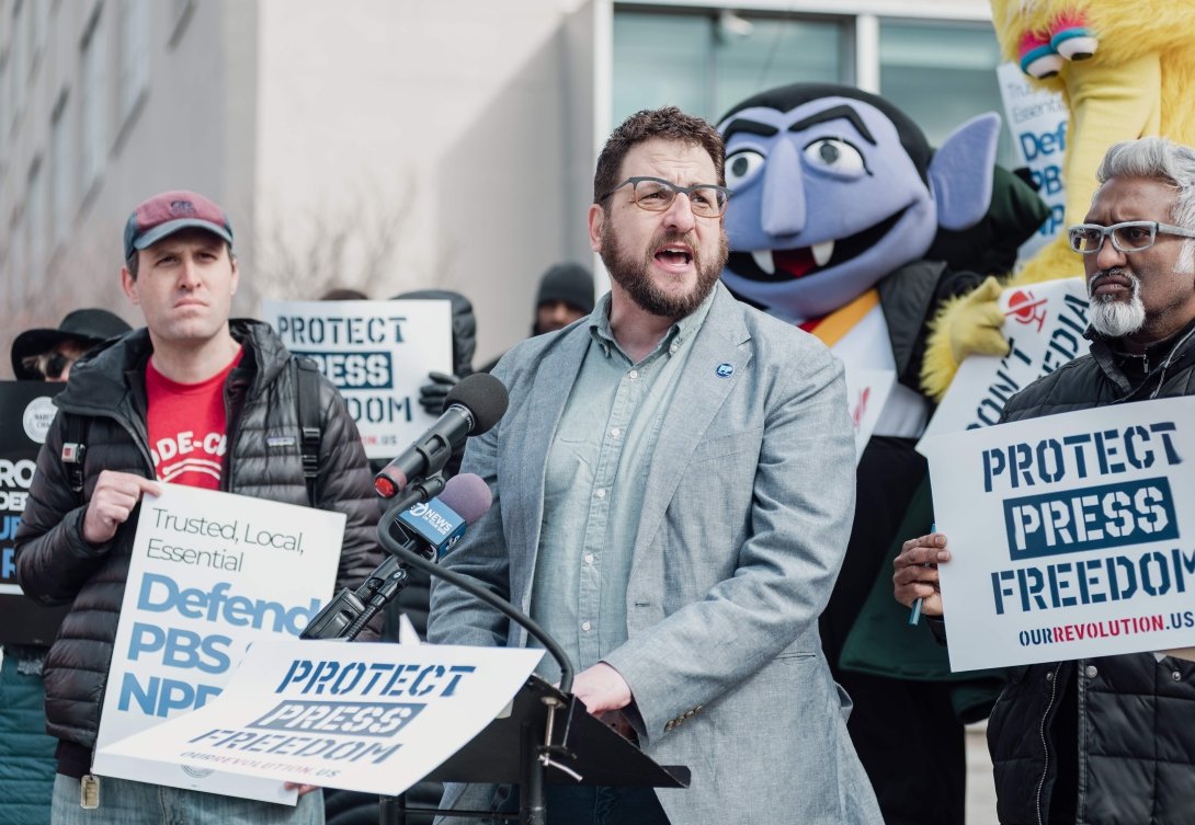 Free Press Co-CEO Craig Aaron speaking outside NPR headquarters at a "Protect Public Media" protest