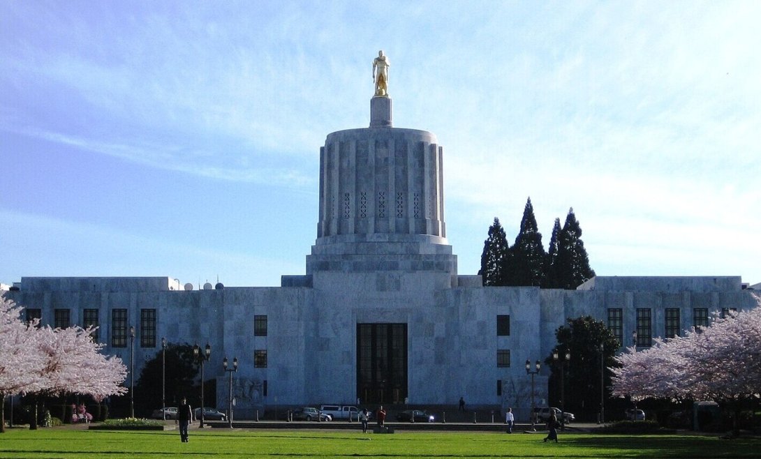 The exterior of the Oregon Statehouse on a spring day