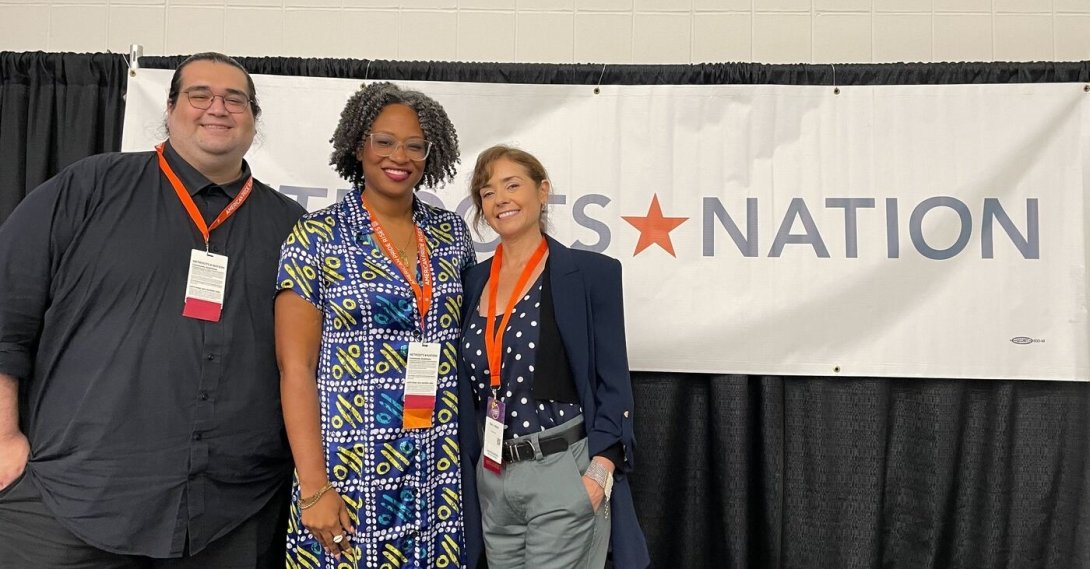 Free Press' Ruth L. Nuñez (right) standing with two people at Netroots